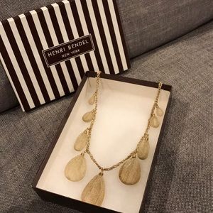 Quartz crystals in gold mesh necklace by Lee Angel